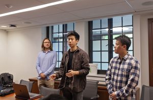 Group of 3 students presenting