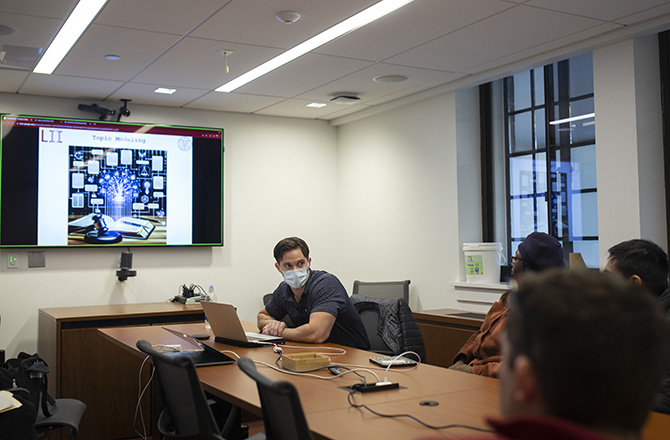 Meng student presenting to a room